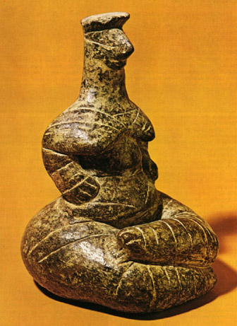 seated woman with slight smile and snake-like striations on her body