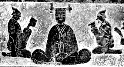 seated goddess wearing the sheng headdress, with knobs at both ends