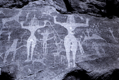 women with arms raised in invocation