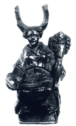 estatueta de bronze sentada